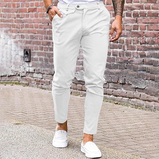 Man wearing LV Signature Luxury Trouser in stylish white, perfect for casual and formal occasions.
